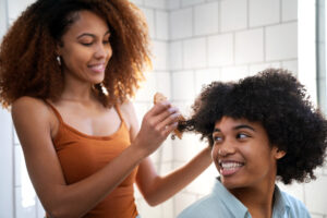 a woman brushing her hair